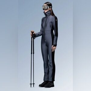 Fusalp black ski suit with striped sides